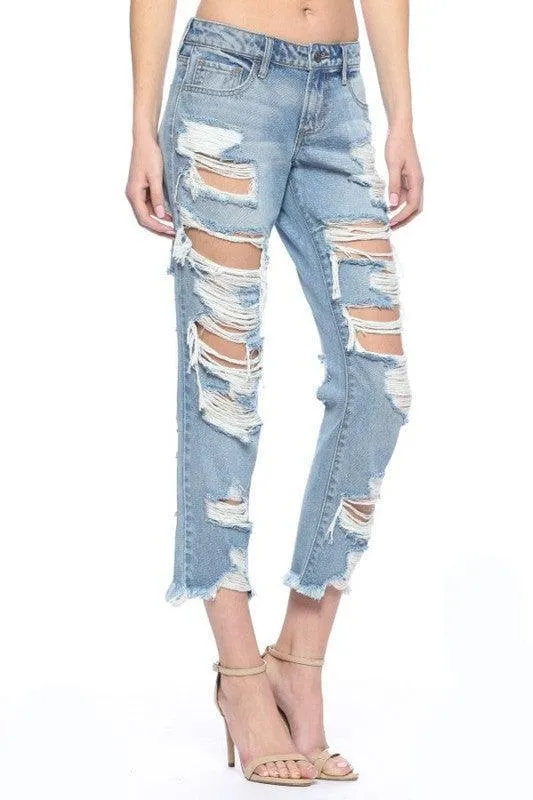 Mid level heavy destroyed jeans