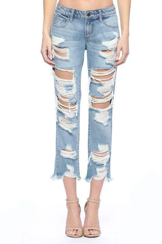 Mid level heavy destroyed jeans