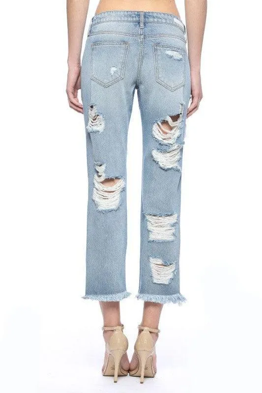 Mid level heavy destroyed jeans