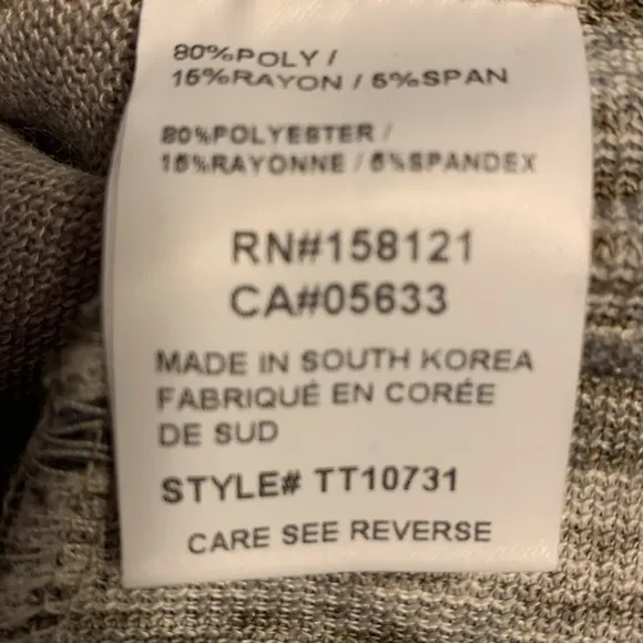 Trisha Tyler, women’s knit top size M
