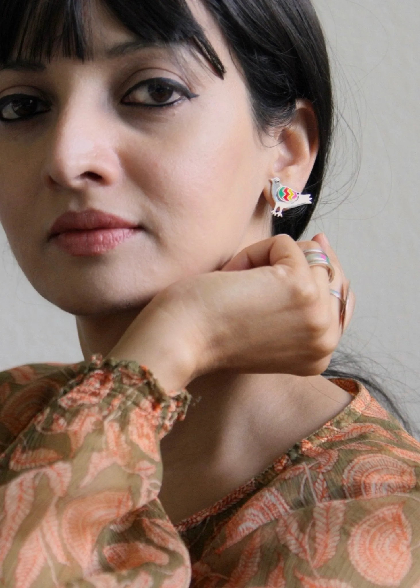 Whimsical, asymmetrical 'paksi' (bird) earrings